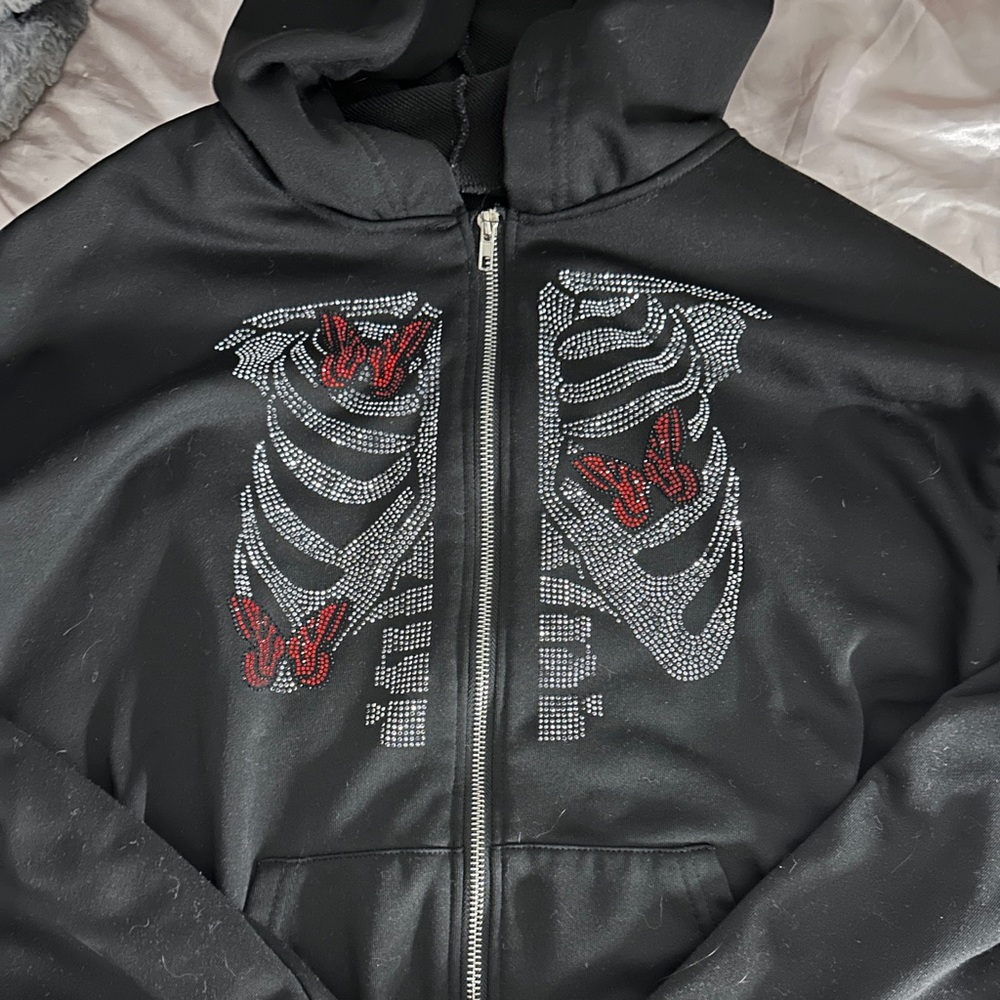 gem skeleton and butterfly zip up